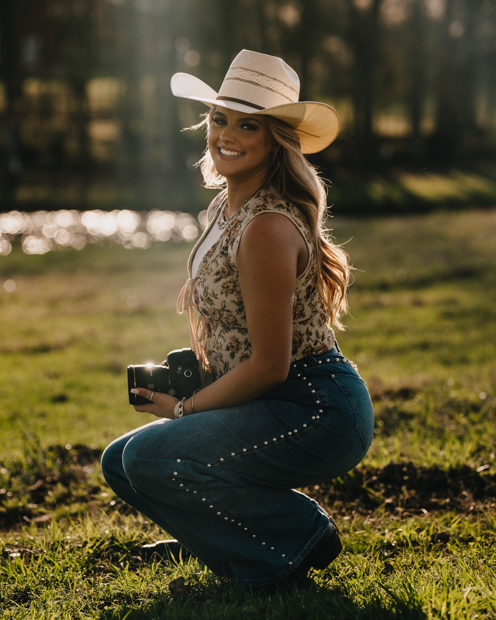 Photographer with camera in golden light